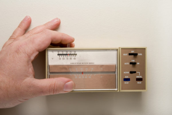 Hand Old Thermostat